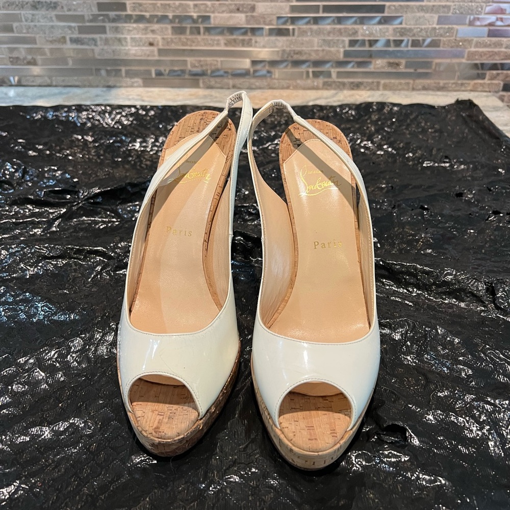 Christian Loubouton white sandals